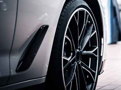 side panel and tire on car